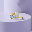 Italian .90 Carat Aquamarine and .90 Carat London Blue Topaz Bypass Ring in 14kt Yellow Gold