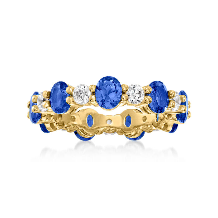 3.10 ct. t.w. Simulated Sapphire and .90 ct. t.w. CZ Eternity Band in 18kt Gold Over Sterling