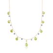 17.70 ct. t.w. Peridot and 2.00 ct. t.w. Iolite Bead Station Necklace in 14kt Yellow Gold