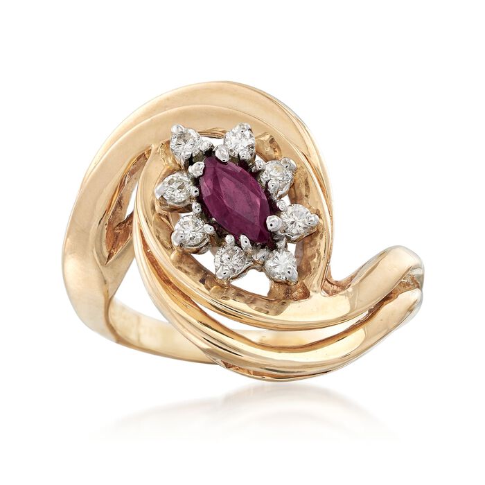 C. 1980 Vintage .25 Carat Ruby and .20 ct. t.w. Diamond Swirl Ring in 14kt Yellow Gold