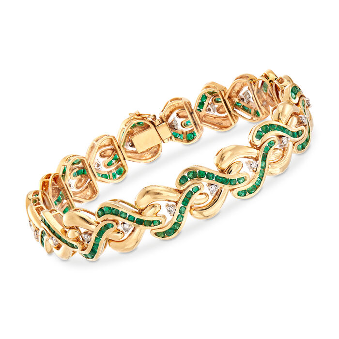 C. 1980 Vintage 5.25 ct. t.w. Emerald and .60 ct. t.w. Diamond Crisscross Link Bracelet in 14kt Yellow Gold