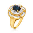 C. 1980 Vintage 1.55 Carat Sapphire and .85 ct. t.w. Diamond Floral Ring in 14kt Yellow Gold