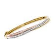 C. 1990 Vintage 1.01 ct. t.w. Diamond Twisted Bangle Bracelet in 14kt Tri-Colored Gold
