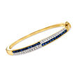 C. 1980 Vintage 2.40 ct. t.w. Sapphire and .65 ct. t.w. Diamond Bangle Bracelet in 18kt Yellow Gold