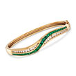 C. 1980 Vintage 2.50 ct. t.w. Emerald and 1.00 ct. t.w. Diamond Bangle Bracelet in 14kt Yellow Gold