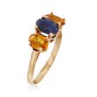 C. 1990 Vintage 1.80 ct. t.w. Blue and Orange Sapphire Three-Stone Ring in 14kt Yellow Gold
