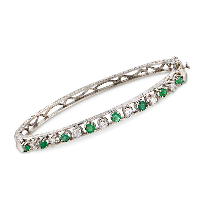 C. 1980 Vintage .80 ct. t.w. Emerald and .55 ct. t.w. Diamond Bangle Bracelet in 14kt White Gold