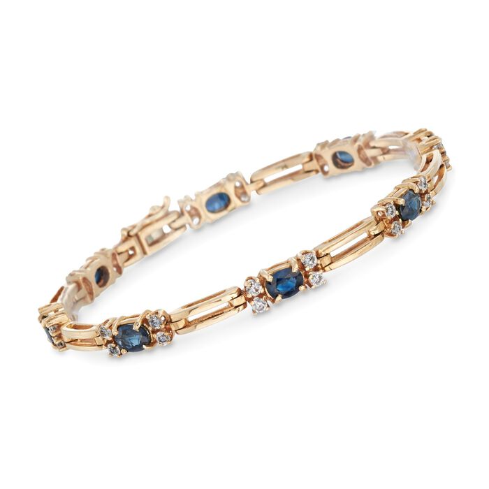 C. 1980 Vintage 2.80 ct. t.w. Sapphire and 1.20 ct. t.w. Diamond Bracelet in 14kt Yellow Gold