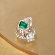 1.30 Carat Emerald and .30 ct. t.w. Baguette and Round Diamond Halo Ring in 14kt White Gold