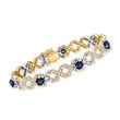 C. 1990 Vintage 5.25 ct. t.w. Sapphires and 3.50 ct. t.w. Diamond XO Bracelet in 14kt Two-Tone Gold