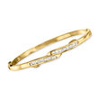 C. 1990 Vintage .85 ct. t.w. Diamond Bypass Bangle Bracelet in 18kt Yellow Gold