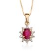 .10 ct. t.w. Diamond and .40 Carat t.w. Ruby Pendant Necklace in 14kt Yellow Gold