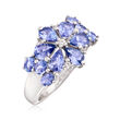 3.10 ct. t.w. Tanzanite and .10 ct. t.w. White Topaz Floral Ring in Sterling Silver