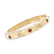 1.30 ct. t.w. Garnet Bangle Bracelet in 14kt Yellow Gold with Diamond Accents