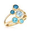 2.00 ct. t.w. Tonal Blue Topaz and .10 ct. t.w. Diamond Ring in 14kt Yellow Gold