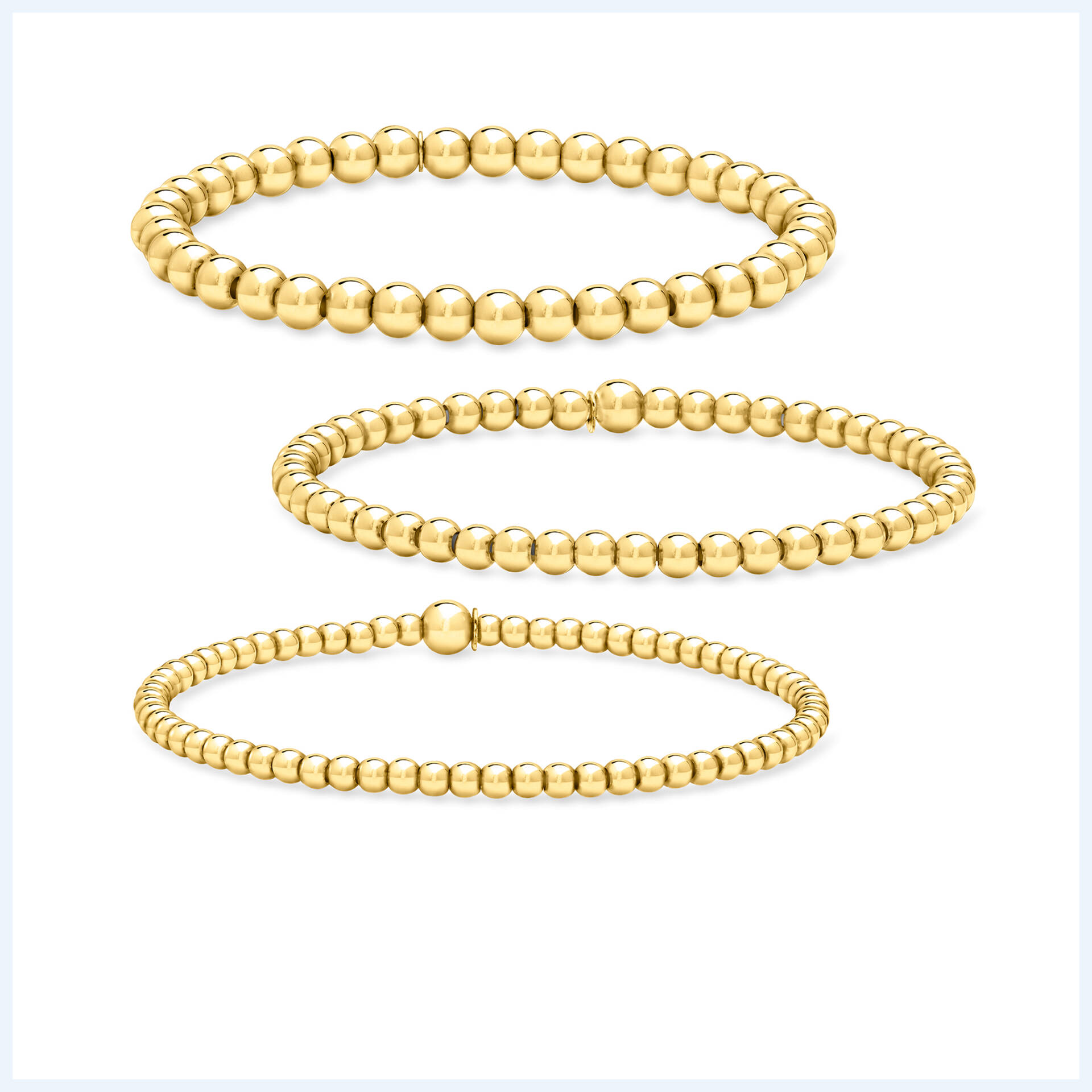 Bracelets. Image Featuring 3 Gold Bead Bracelets of Different Sizes
