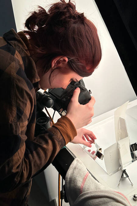 Photographer taking jewelry product shots