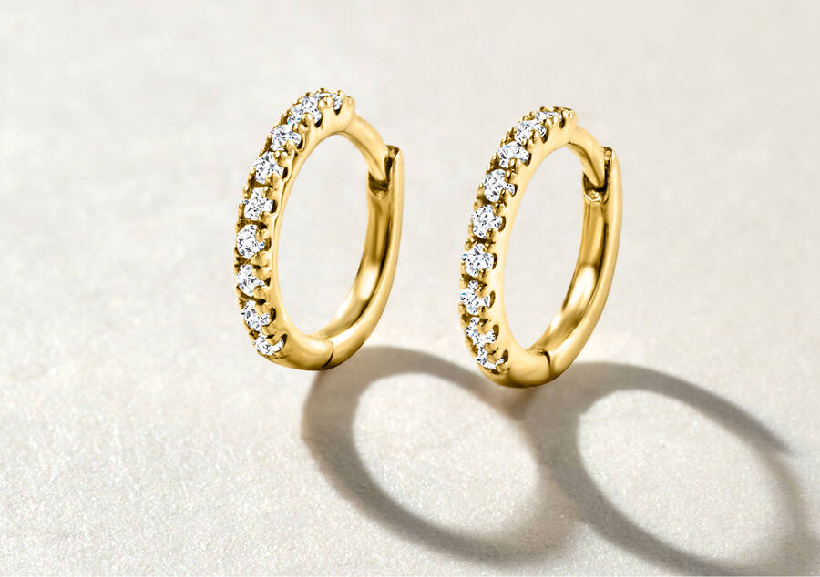 image featuring clicker hoop earrings with diamonds