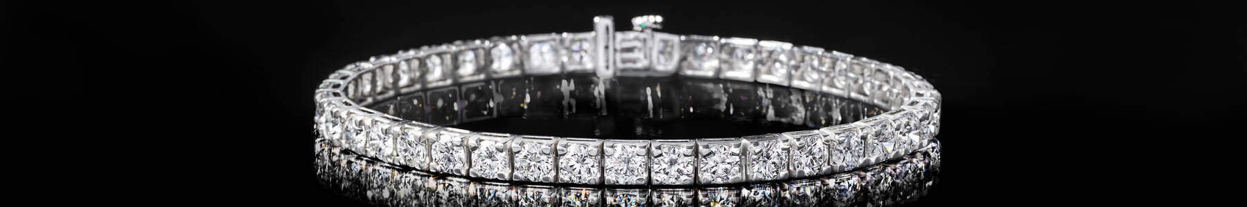 image featuring a Lab-Grown Diamond Tennis Bracelet on black background