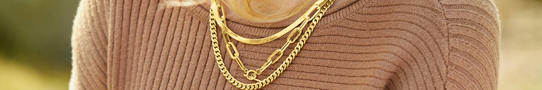 Gold Chain Necklaces on a model