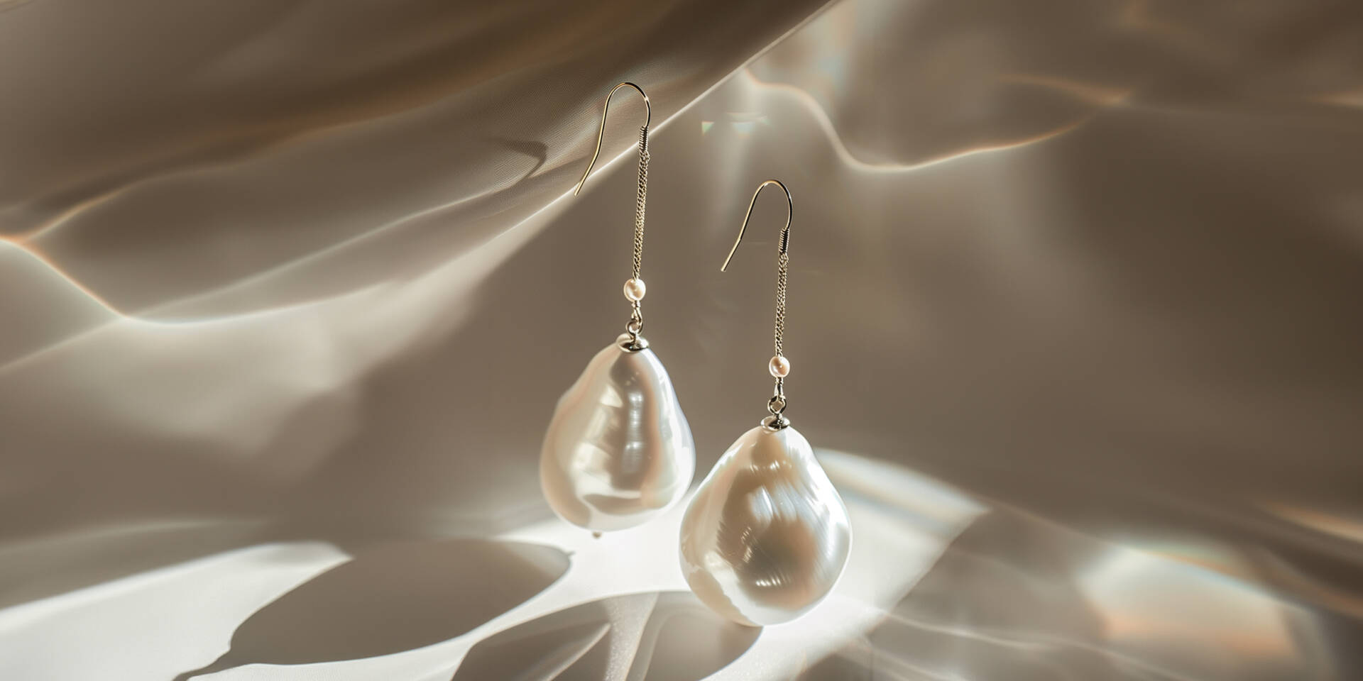 a pair of mother of pearl earrings drop