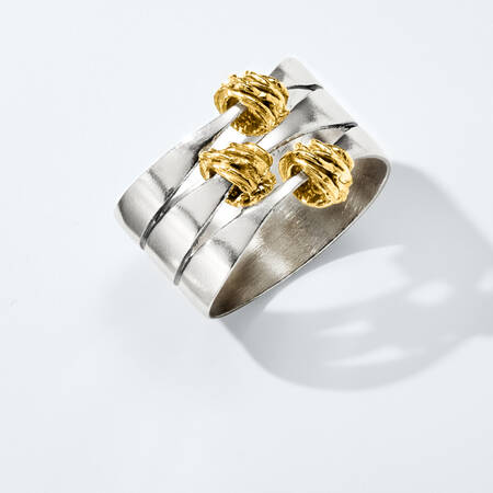 $79 and under rings. image featuring a two-tone gold and silver ring