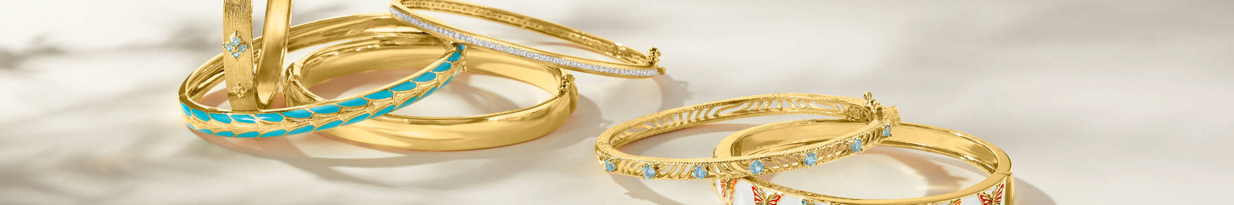 image featuring several stackable bangle bracelets