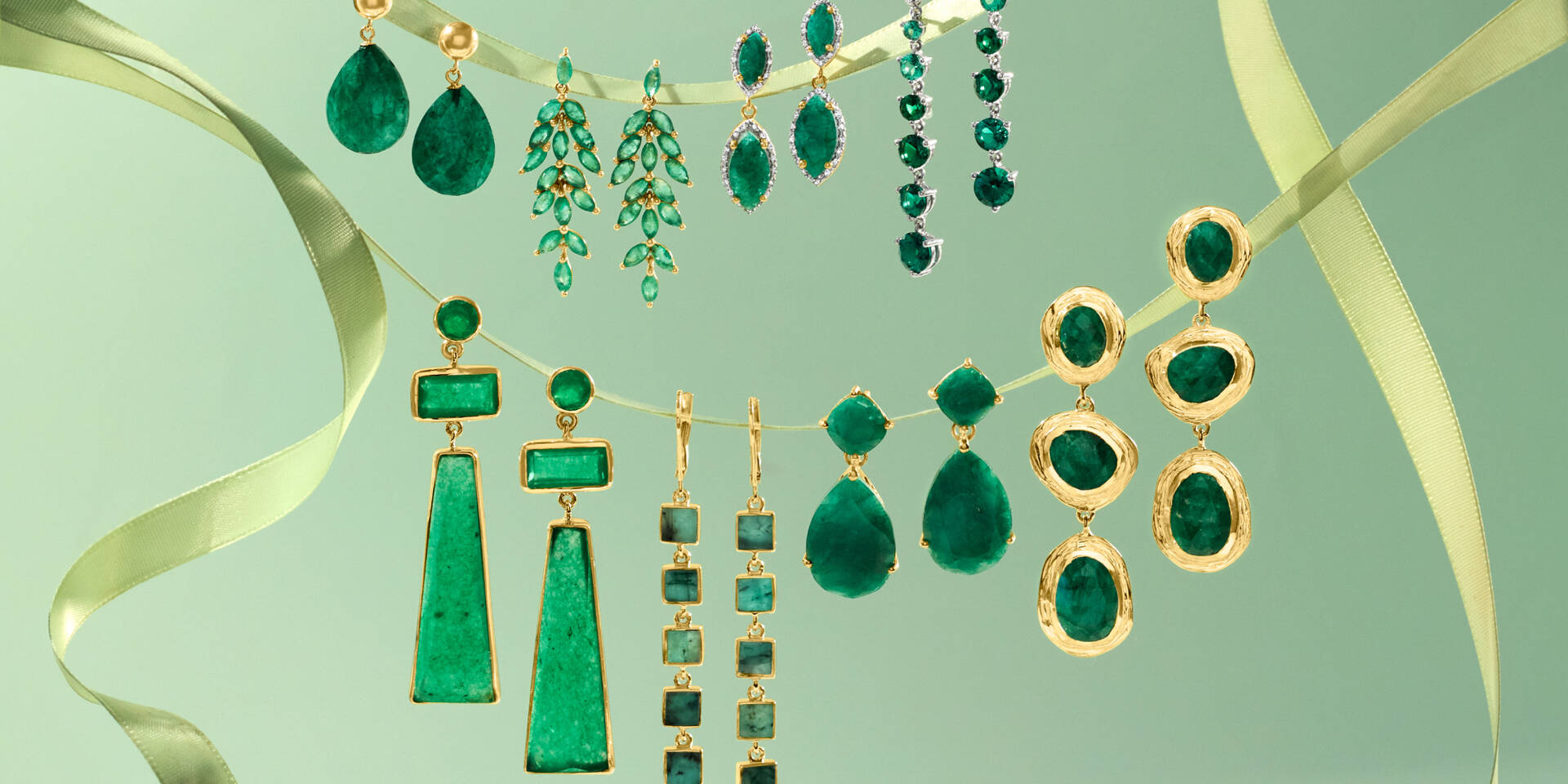 8 pairs of various emerald drop earrings