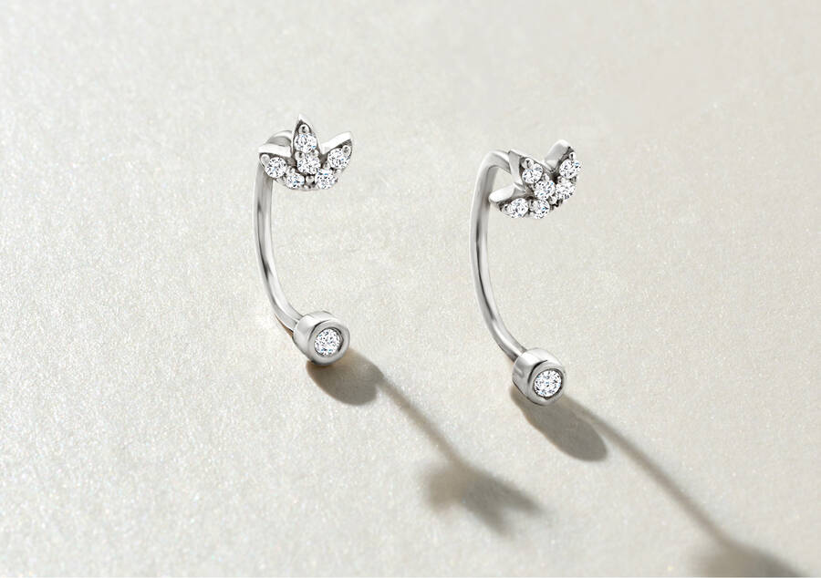image featuring diamond and silver u-hoop earrings