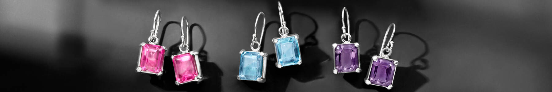 Silver and Gemstone Drop Earrings. image featuring 3 pairs of gemstone and silver earrings