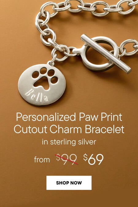 Personalized Paw Print Cutout Charm Bracelet in Sterling Silver. From $69