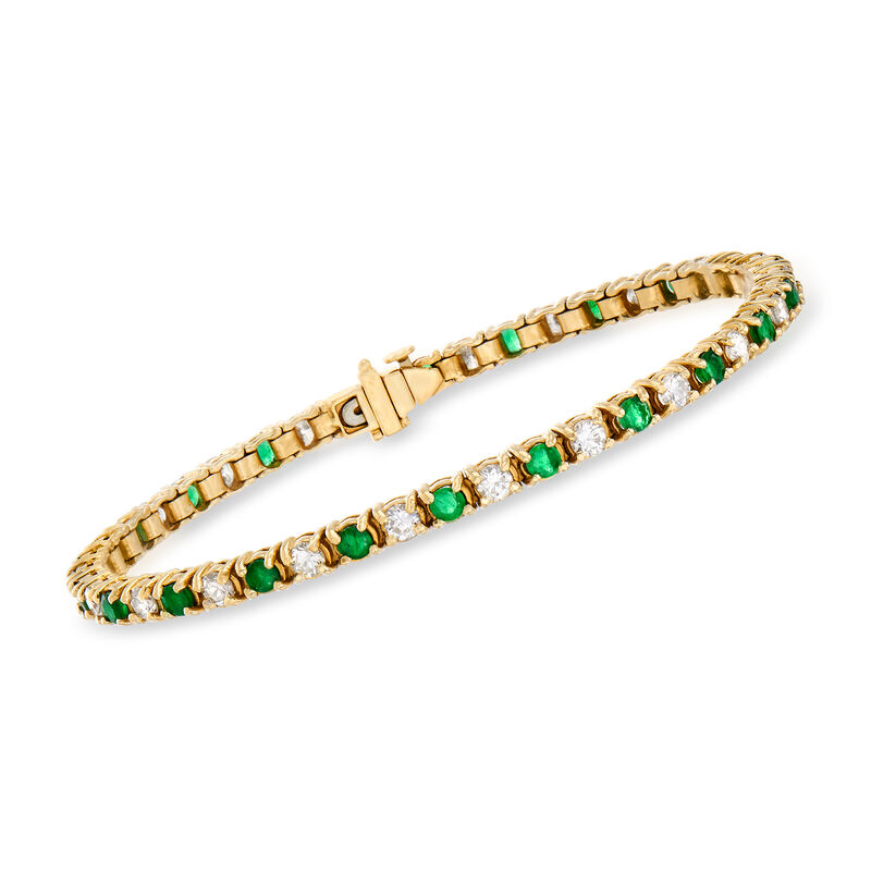 C. 1980 Vintage 2.65 ct. t.w. Diamond and 2.50 ct. t.w. Emerald Line Bracelet in 14kt Yellow Gold. 7&quot; image number 0