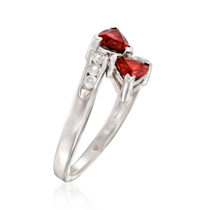 1.10 ct. t.w. Garnet and .10 ct. t.w. White Topaz Bypass Ring in Sterling Silver image number 1