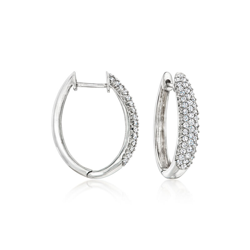C. 1990 Vintage 1.40 ct. t.w. Diamond Oval Hoop Earrings in 14kt White Gold. 7/8" image number 0