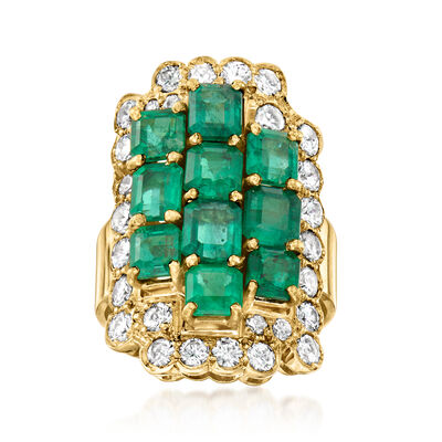 C. 1980 Vintage 4.10 ct. t.w. Emerald and 1.75 ct. t.w. Diamond Cluster Ring in 18kt Yellow Gold