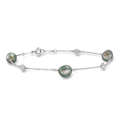 C. 1990 Vintage Tiffany Jewelry 7x6mm Cultured Black Pearl and .25 ct. t.w. Diamond Station Bracelet in Platinum