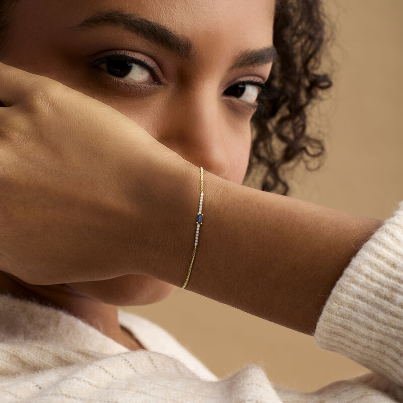 .10 Carat Sapphire and .11 ct. t.w. Diamond Bar Bracelet in 14kt Yellow Gold image number 1