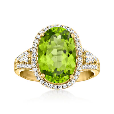 C. 2000 Vintage 5.75 Carat Peridot Ring with .60 ct. t.w. Diamonds in 14kt Yellow Gold