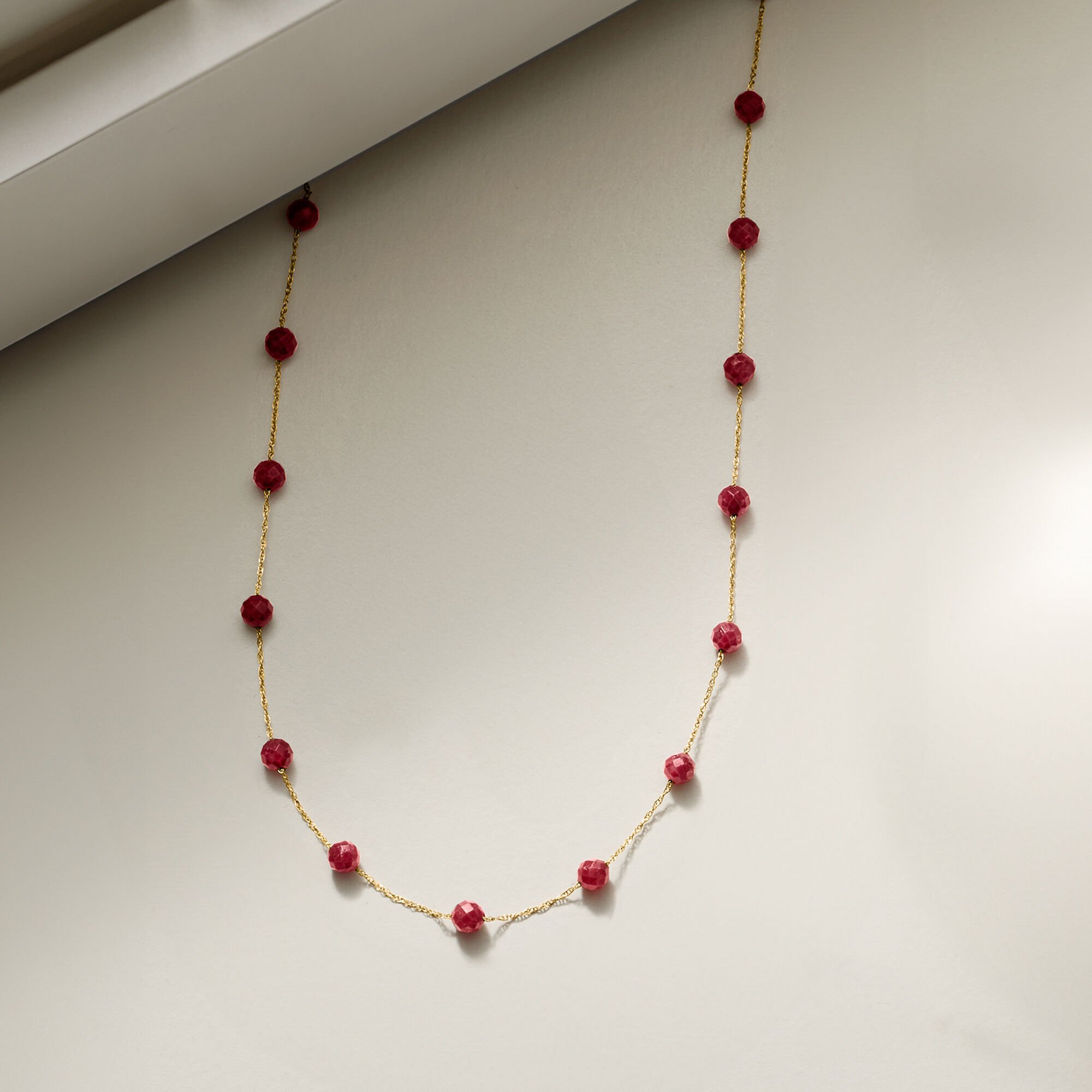 14.00 ct. t.w. Ruby Bead Station Necklace in 10kt Yellow Gold