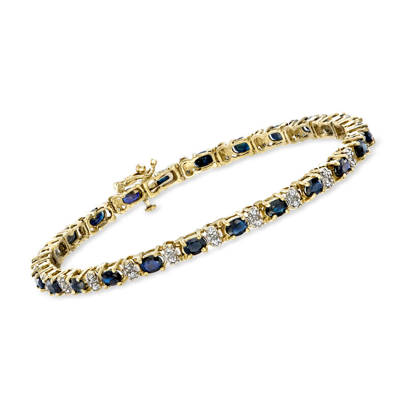 C. 1990 Vintage 4.80 ct. t.w. Sapphire and .50 ct. t.w. Diamond Tennis Bracelet in 10kt Yellow Gold. 7" image number 0