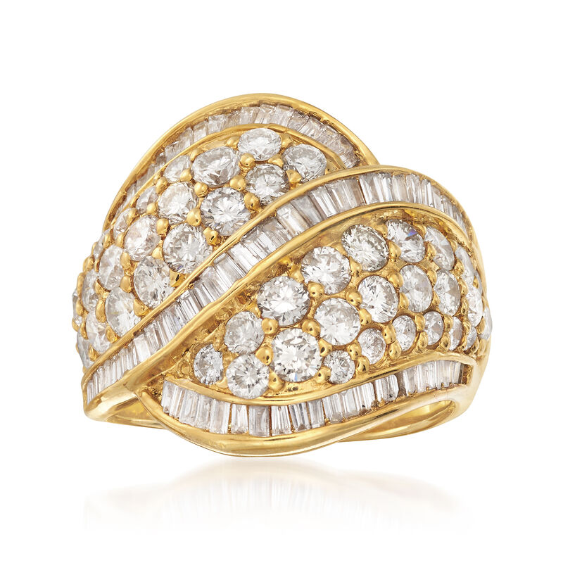 C. 1980 Vintage 3.50 ct. t.w. Round and Baguette Diamond Crossover Ring in 18kt Gold. Size 6.5 image number 0