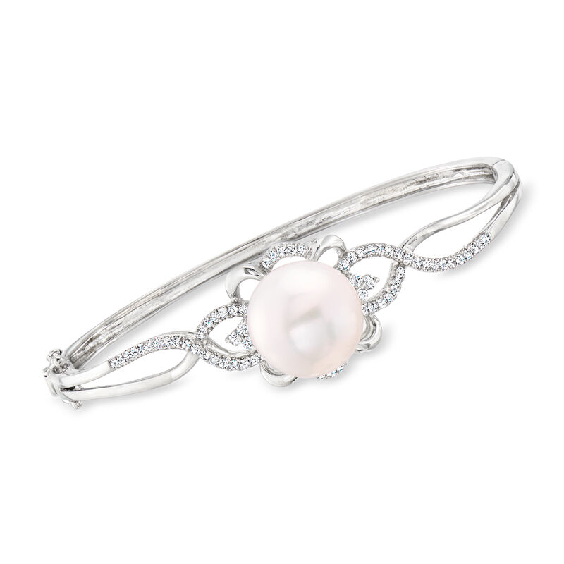 C. 1990 Vintage 13mm Cultured Pearl and .65 ct. t.w. Diamond Bangle Bracelet in 18kt White Gold. 7" image number 0