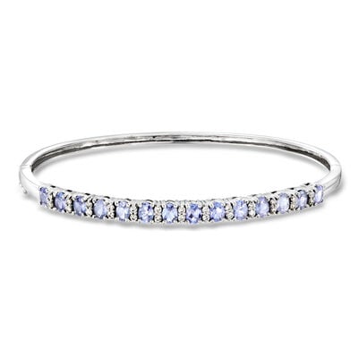 C. 1990 Vintage 2.25 ct. t.w. Tanzanite Bangle Bracelet with .45 ct. t.w. Diamonds in 14kt White Gold