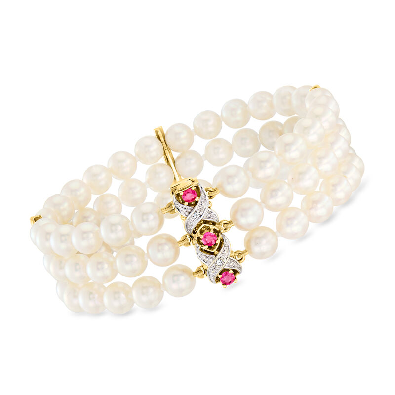 C. 1970 Vintage 6mm Cultured Pearl Three-Row Bracelet with .45 ct. t.w. Rubies and .10 ct. t.w. Diamonds in 14kt Yellow Gold. 7&quot; image number 0