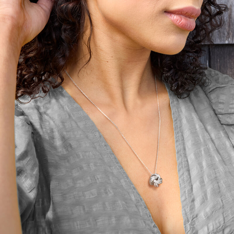 Italian Sterling Silver Love Knot Pendant Necklace. 20" image number 0
