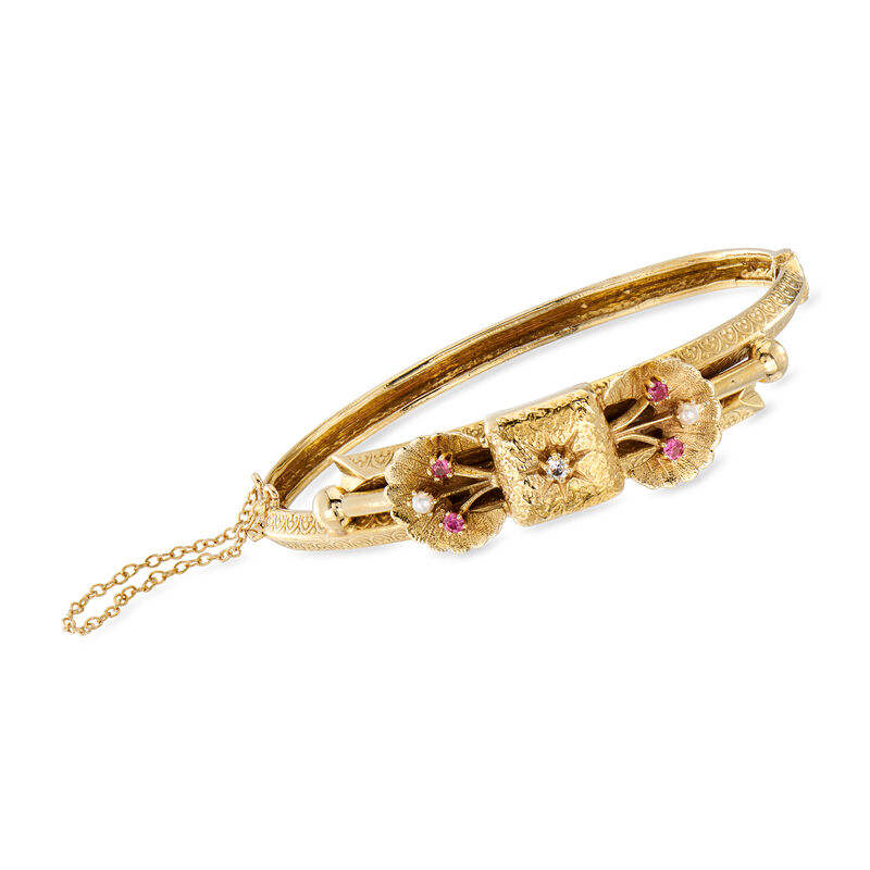 C. 1940 Vintage 2mm Cultured Pearl and .20 ct. t.w. Ruby Bow Bangle Bracelet with Diamond Accents in 14kt Yellow Gold. 7&quot; image number 0