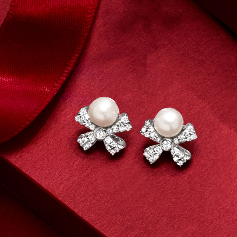 5mm Cultured Pearl and .25 ct. t.w. Diamond Bow Earrings in Sterling Silver  image number 2