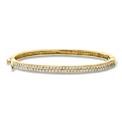 C. 1990 Vintage .82 ct. t.w. Diamond Bangle Bracelet in 14kt Yellow Gold