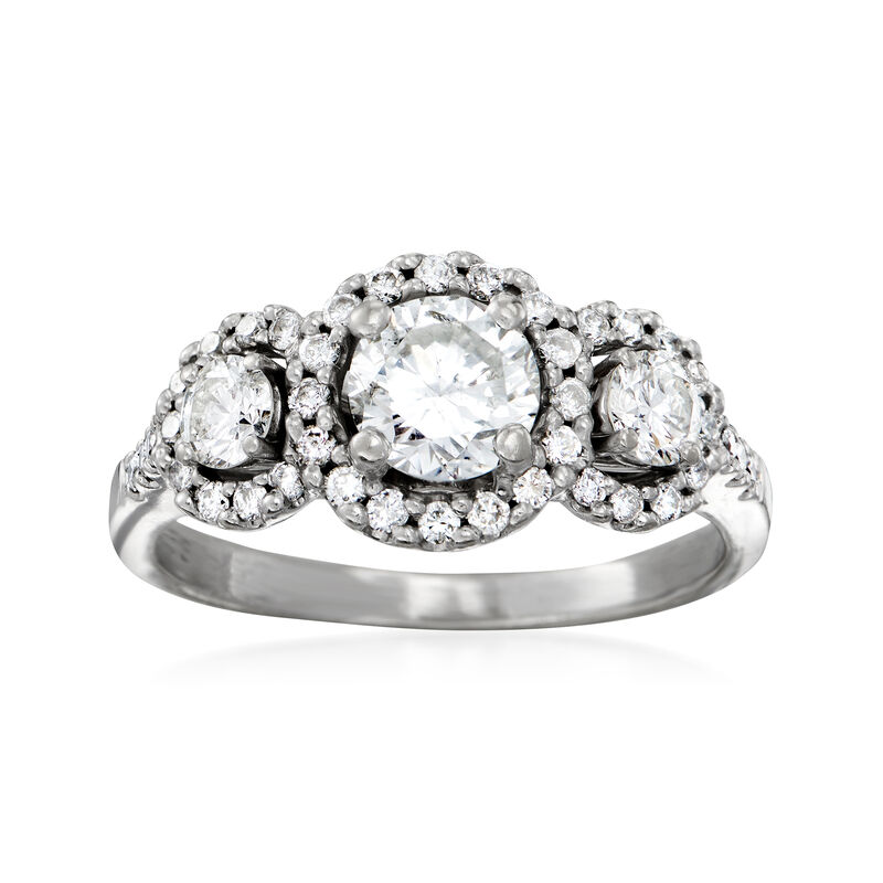 C. 1990 Vintage 1.45 ct. t.w. Diamond Three-Stone Halo Ring in 14kt White Gold. Size 7 image number 0