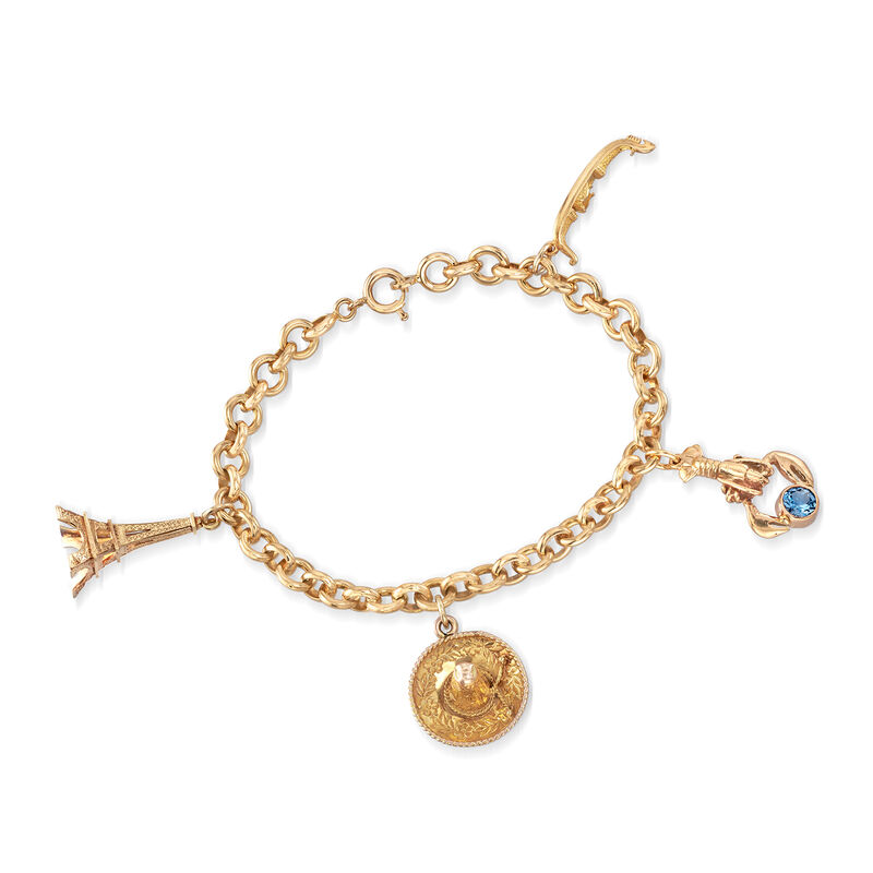 C. 1980 Vintage .60 Carat Blue Topaz Charm Bracelet in 18kt Yellow Gold. 8.25&quot; image number 0